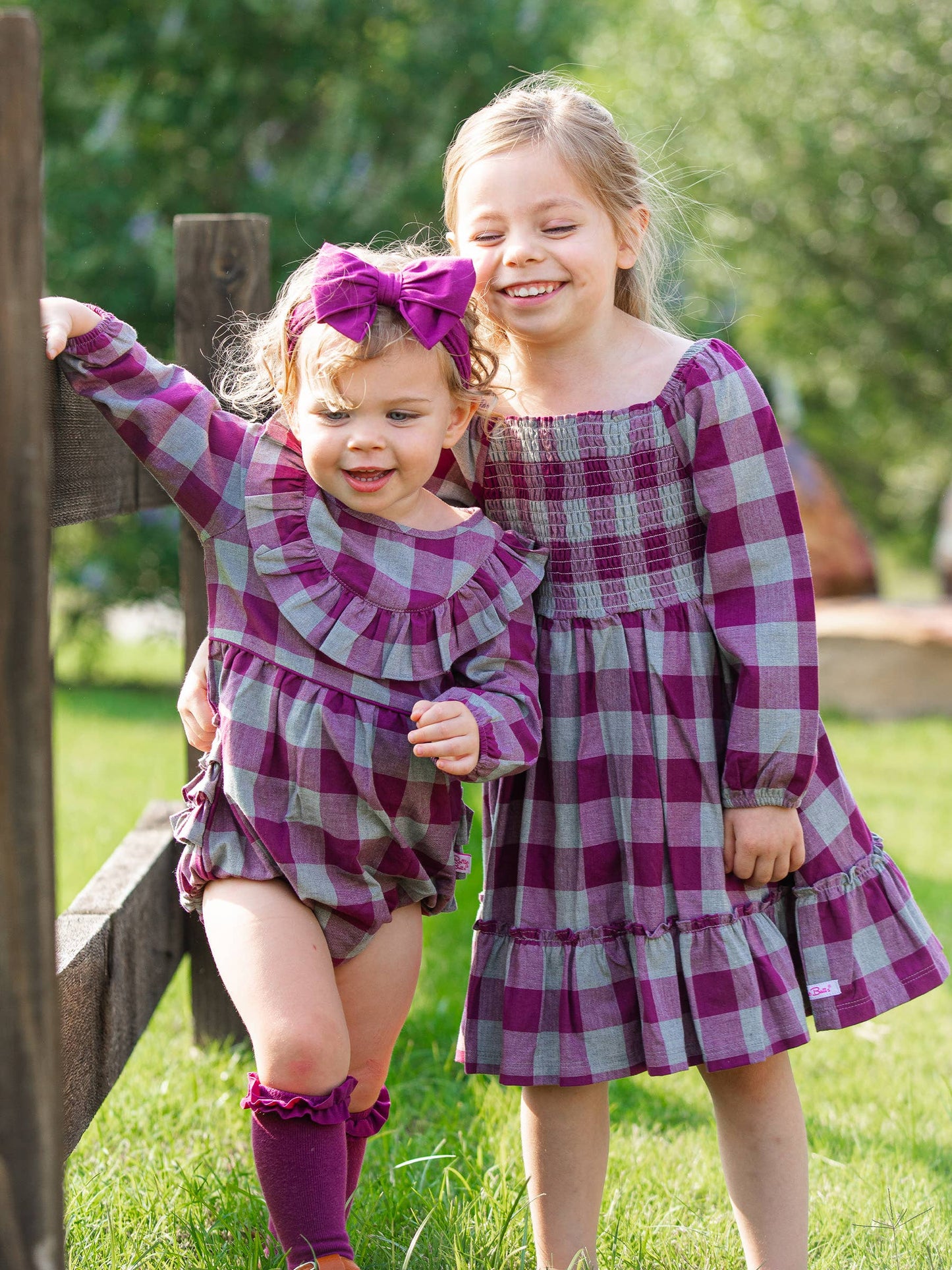 RuffleButts + RuggedButts - Girls Hartford Plaid Long Sleeve Smocked Ruffle Hem Dress