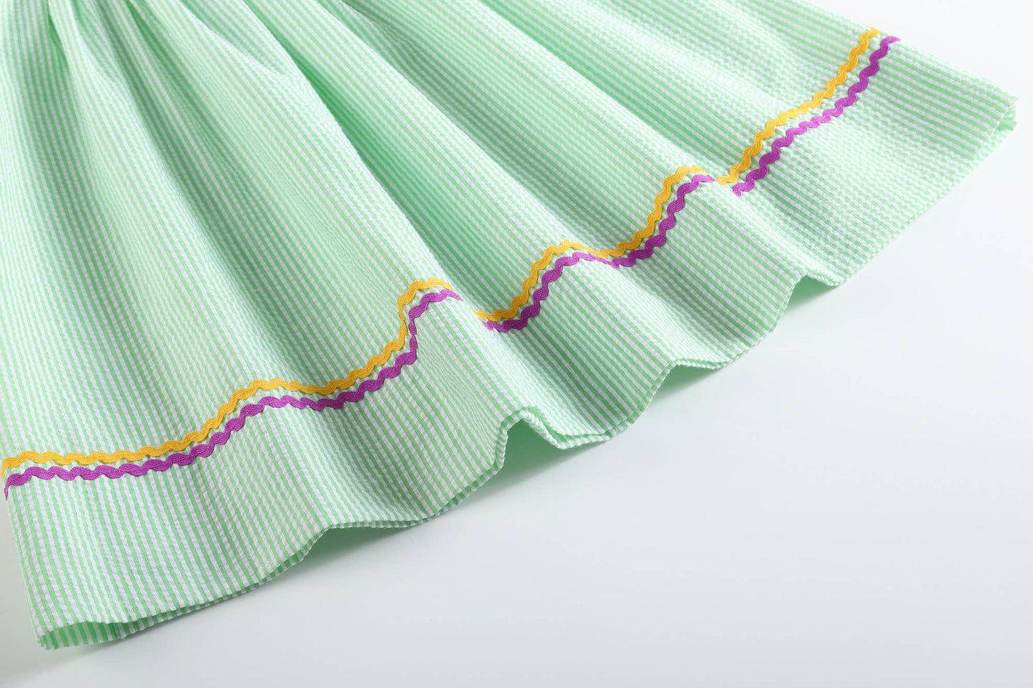 Lil Cactus - Green and Purple Mardi Gras Smocked Bishop Dress