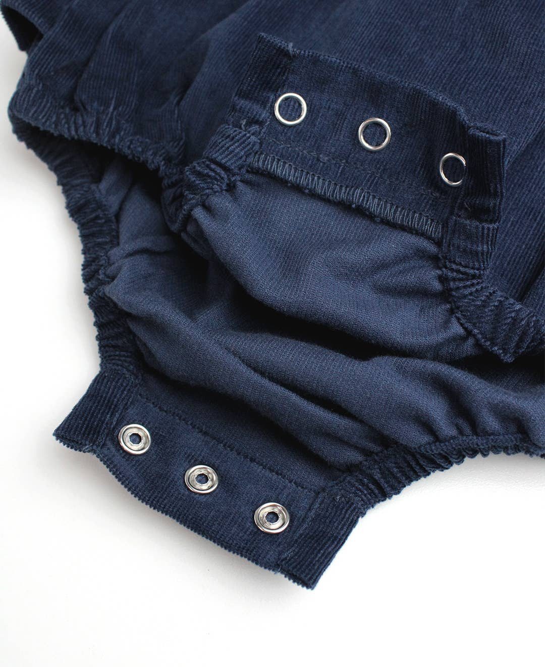 RuffleButts + RuggedButts - Baby Girls Dark Navy Stretch Corduroy Waterfall Bubble Romper