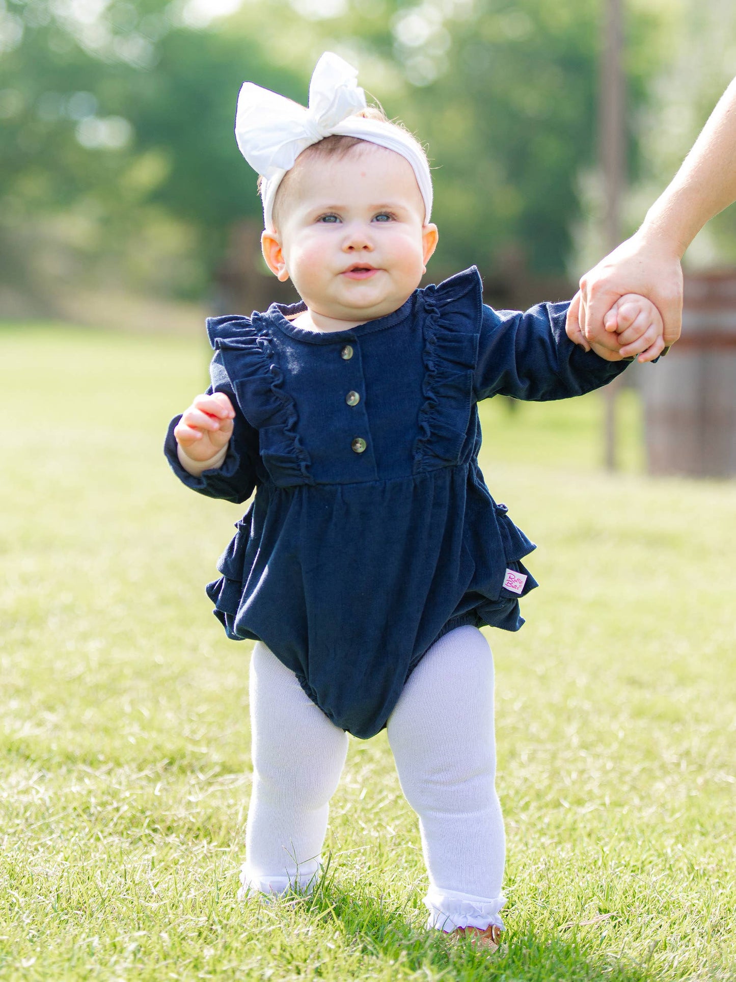 RuffleButts + RuggedButts - Baby Girls Dark Navy Stretch Corduroy Waterfall Bubble Romper